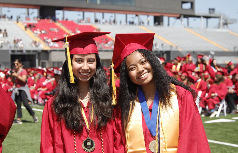 Saddleback graduates 2 females
