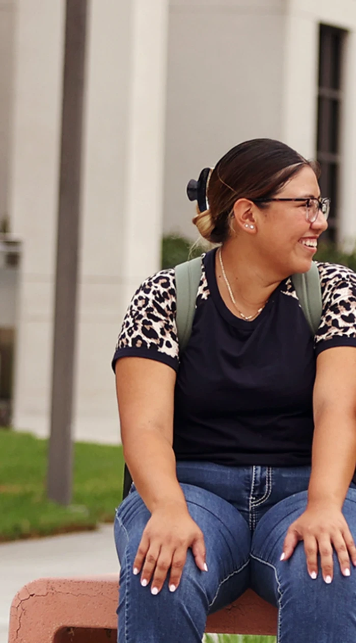 students walking and sitting on campus
