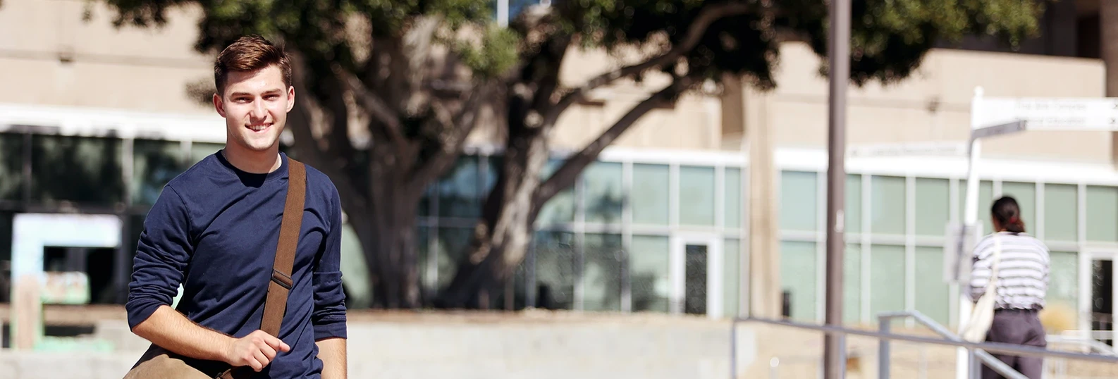 student walking on campuse