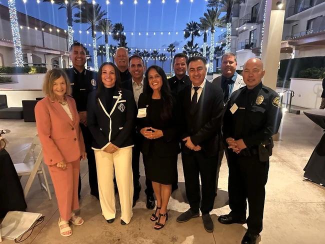 trustees milchiker, prendergast, president cordova, and chancellor barnes pose with first responder leaders
