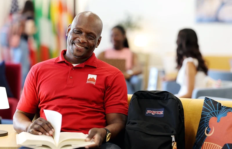 Saddleback College man with book